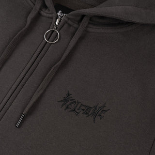 Up close view of embroidered welcome logo.