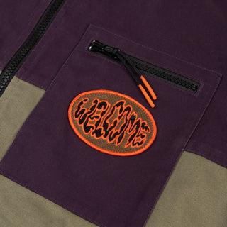 Up close view of chest pocket patch.