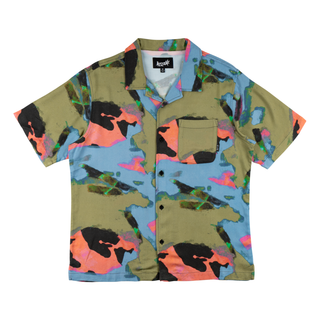 front view of Impression rayon camp collared shirt olive. All over abstract print. Front left chest pocket with scrawl logo flag label on side. Black welcome buttons.