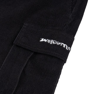 Up close view of embroidered welcome logo. on cargo pocket flap.