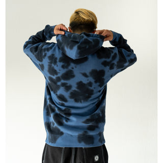 Back view of model wearing hoodie.