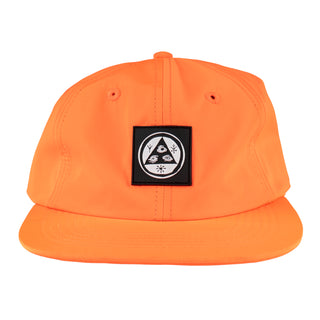 Front view of talisman PVC patch nylon hat bright orange. Square PVC talisman logo patch in center of hat.