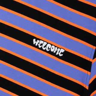 Up close view of embroidered welcome logo.