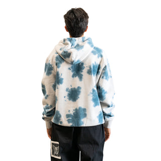 Back view of model wearing hoodie.