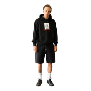 Front view of model wearing hoodie.