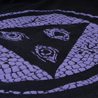 Up close view of view back talisman logo. Puff print visible.